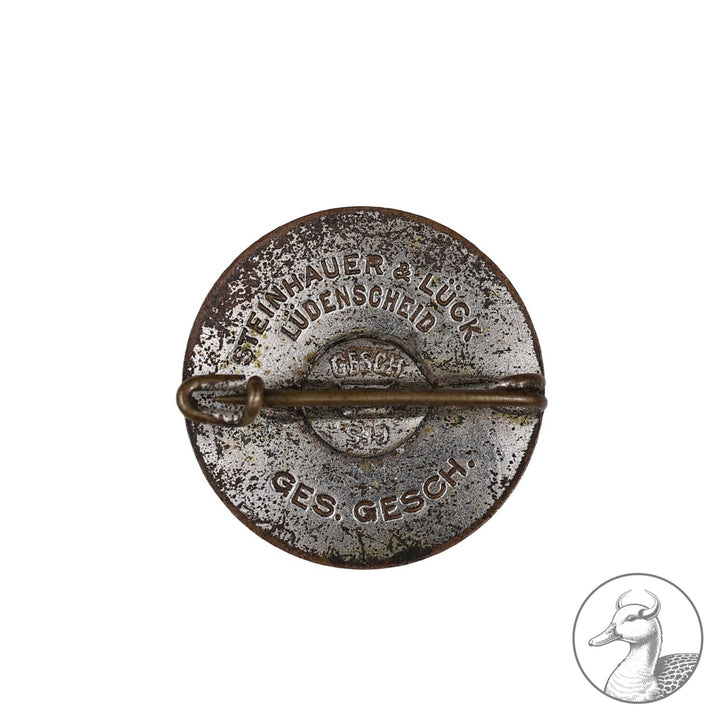 Frühes Parteiabzeichen der Firma Steinhauer und Lück im getragenen Zustand,rückseitig Hersteller und Ges.Gesch. markiert,altersbedingte Patina