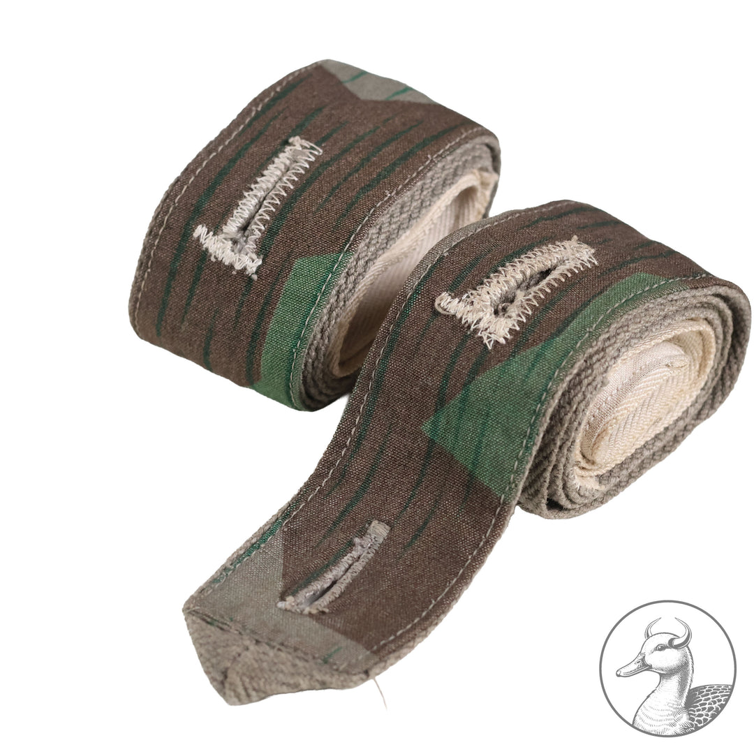 Originale Hosenträger der Wehrmacht in Splittertarn

Wehrmacht Hosenträger aus hellem Leinenstoff-Splittertarn