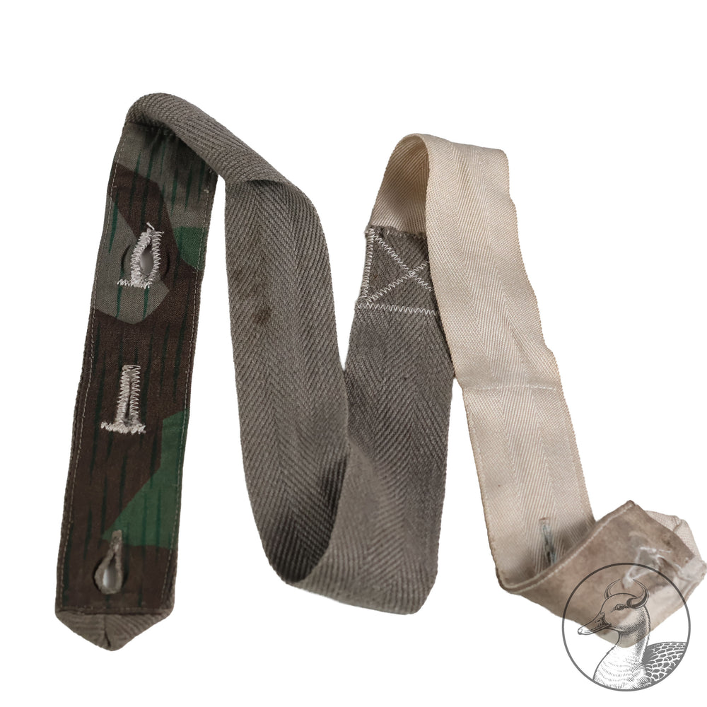 Originale Hosenträger der Wehrmacht in Splittertarn

Wehrmacht Hosenträger aus hellem Leinenstoff-Splittertarn