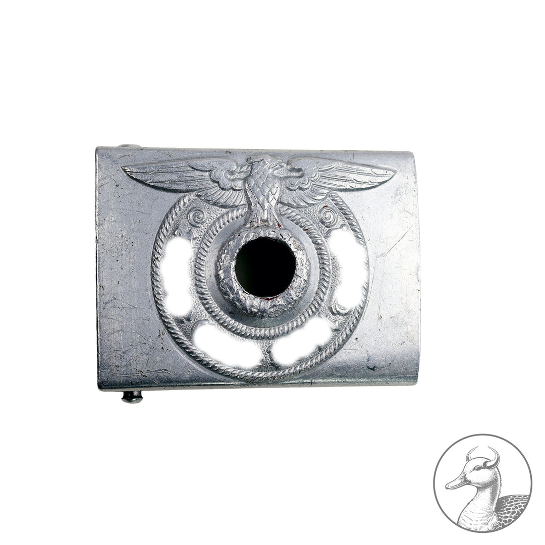 Typ: Koppelschloss der Waffen-SS Aluminium
Hersteller: RZM 822/37 Richard Sieper und Söhne Lüdenscheid
Zustand: Hoheitsabzeichen abgeschliffen;, sammelwürdig